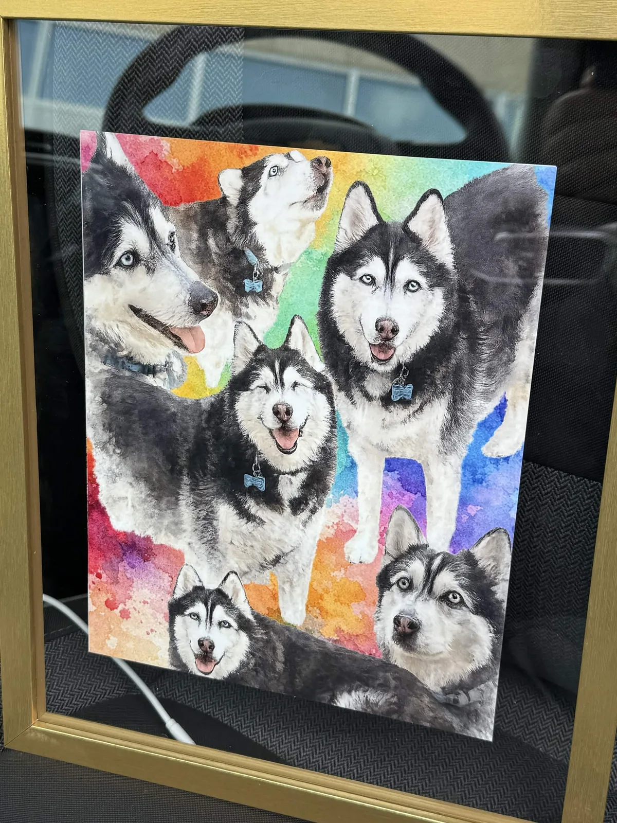 Framed watercolor-style portrait artwork featuring Zeus